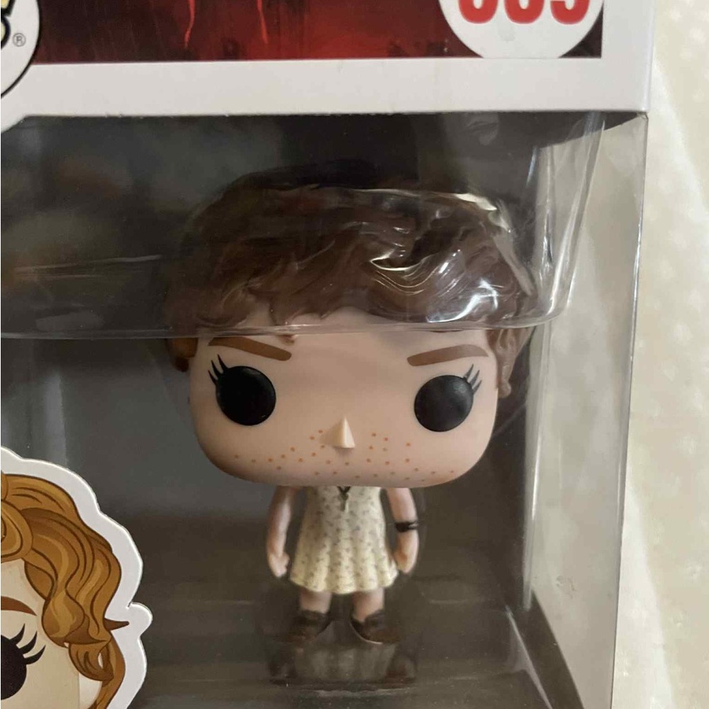 Funko Pop Movies Figure with Brown Hair and White Dress